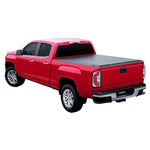 Access TonnoSport low-profile black roll-up tonneau cover installed on a truck with a 6ft stepside bed.