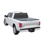Black low-profile Access Vanish roll-up tonneau cover installed on a Ford Super Duty truck bed with a 6ft 8in bed.