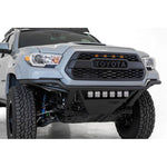 Addictive Desert Designs PRO Bolt-On Front Bumper in Hammer Black with aluminum skid plate for Toyota Tacoma.