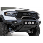 Hammer Black Addictive Desert Designs Bomber front bumper with aluminum skid plate on a Ram 1500 TRX.