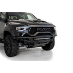 Hammer Black ADD Offroad PRO Bolt-On front bumper for Ram 1500 TRX with parking sensor cutouts and vented aluminum skid plate.
