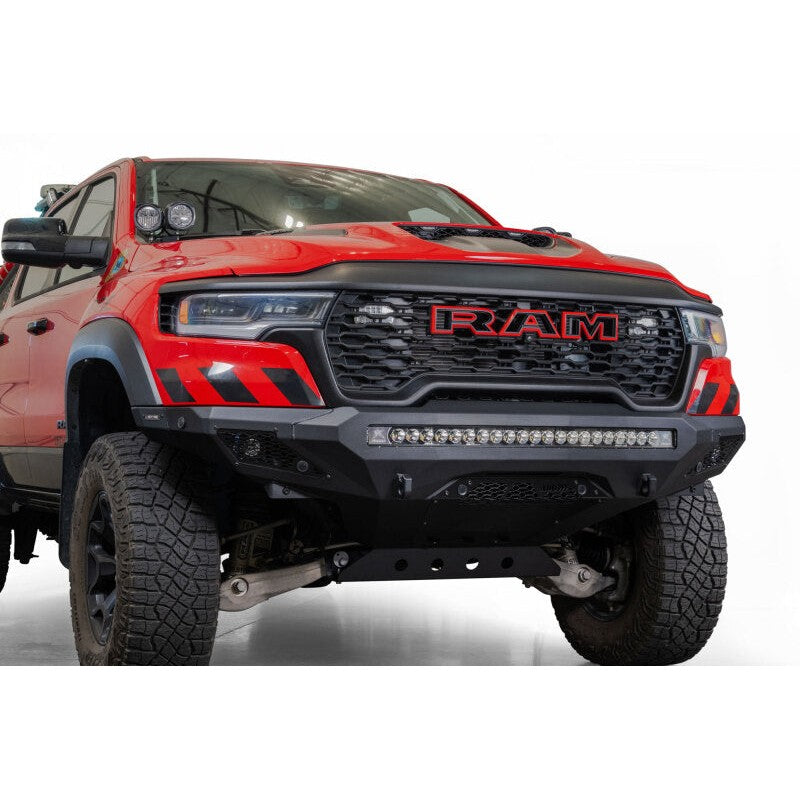 Addictive Desert Designs Stealth Fighter front bumper in hammer black for 2025 Ram 1500 RHO