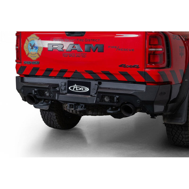 Hammer black Addictive Desert Designs Stealth Fighter rear bumper with light mounts for 2025 Ram 1500 RHO