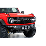 Hammer Black Addictive Desert Designs Bomber front bumper for 2021-2025 Ford Bronco with mounts for three 6-inch lights.