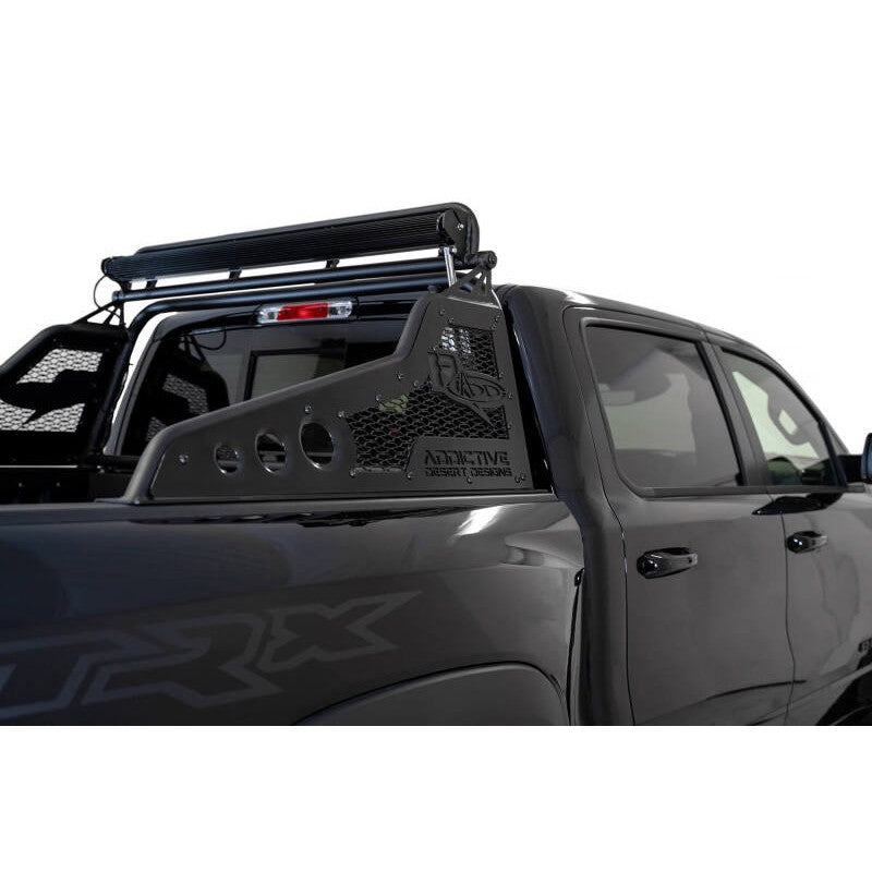 Hammer Black Addictive Desert Designs Race Series Chase Rack with motorized light bar mount on a Ram 1500 TRX.