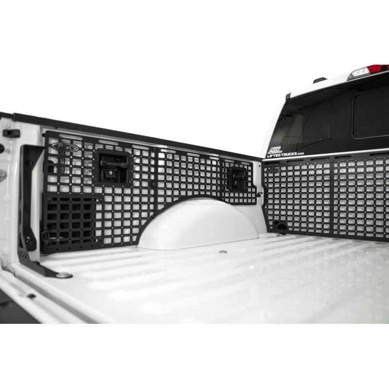 Addictive Desert Designs hammer black steel full driver side bed molle panel set for 2021-2025 Ford F-150 5.5' bed.