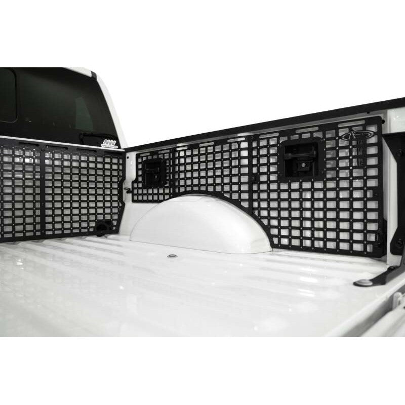 Addictive Desert Designs hammer black steel bed side Molle panels for 2021-2025 Ford F-150 passenger side.