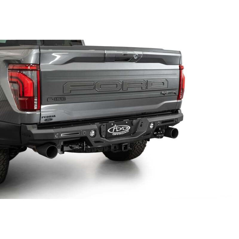 Hammer black steel Rock Fighter rear bumper for 2021-2025 Ford F-150 Raptor with side cube light mounts.