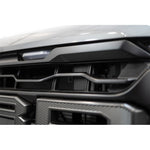 Addictive Desert Designs hammer black Adaptive Cruise Control relocation bracket for 2024-2026 Ford F-150 Raptor.