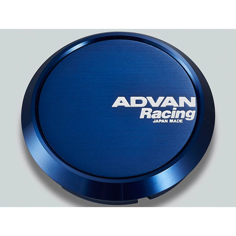 Advan 73mm flat center cap with a vibrant blue anodized finish