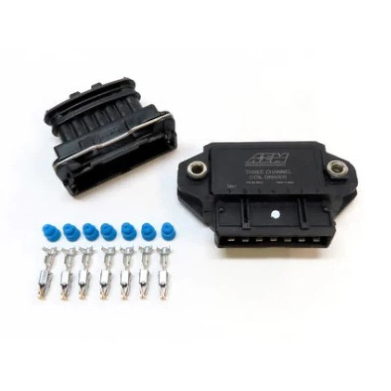Compact black AEM 1-channel ignition coil driver module with wiring harness pigtail and mounting hardware.