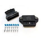 Compact black AEM 1-channel ignition coil driver module with wiring harness pigtail and mounting hardware.