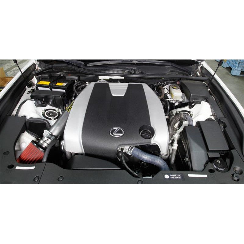 AEM 21-806C gunmetal gray mandrel-bent aluminum intake tube with Dryflow air filter and custom heat shield.
