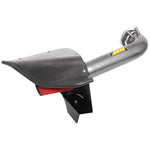 AEM 21-780C cold air intake with gunmetal aluminum tube, carbon fiber heat shield lid, and red Dryflow air filter