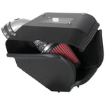 AEM silver mandrel-bent aluminum cold air intake system with a Dryflow air filter and black heat shield with lid.