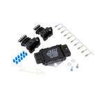 AEM 30-2840 4-channel ignition coil driver module with included wiring harness and mounting hardware.