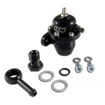 Black CNC-machined AEM adjustable fuel pressure regulator with interchangeable discharge ports.