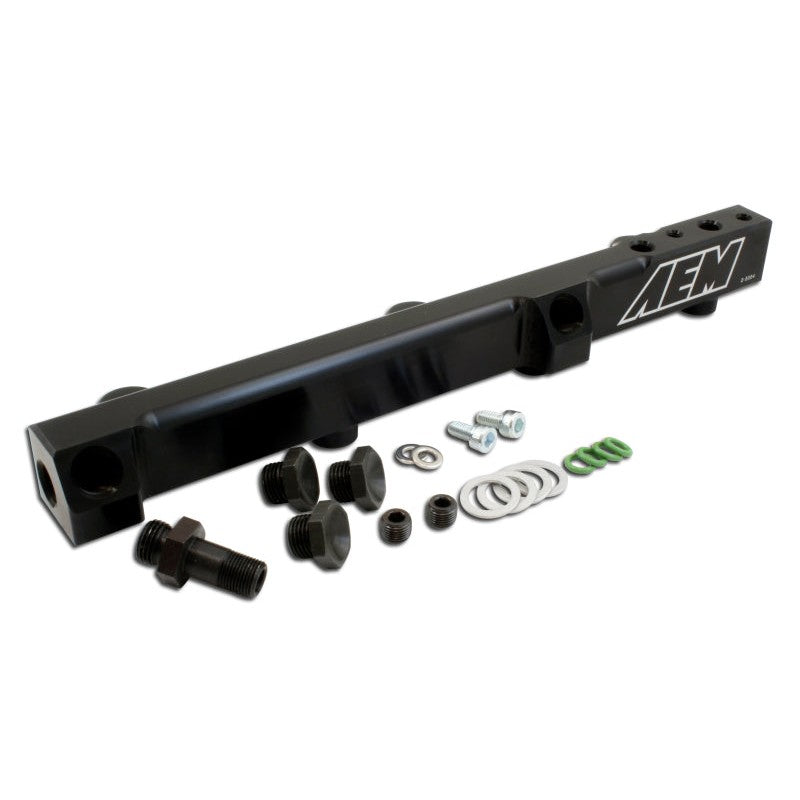 Black anodized AEM billet aluminum fuel rail for 1990-2001 Honda Accord and Prelude with installation hardware.