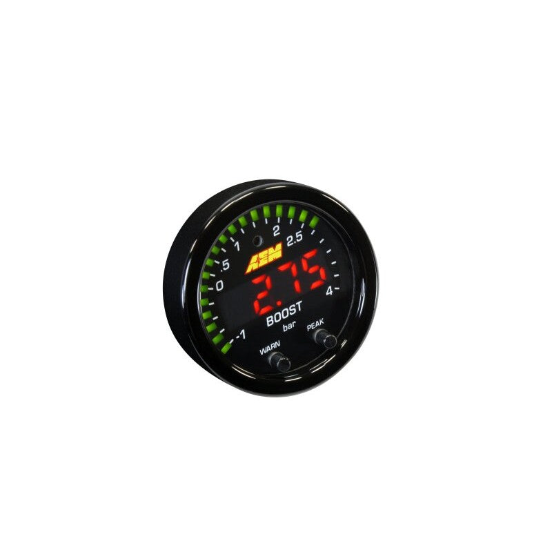 AEM X-Series 52mm digital boost pressure gauge with green outer LEDs and black bezel showing a digital PSI readout.