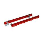 Red anodized Aeromotive billet fuel rails with steel mounting brackets for 1996-2004 Ford Mustang 4.6L engines.