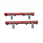 Red anodized CNC-machined billet aluminum fuel rails with steel mounting brackets for Ford Mustang 4.6L engines.