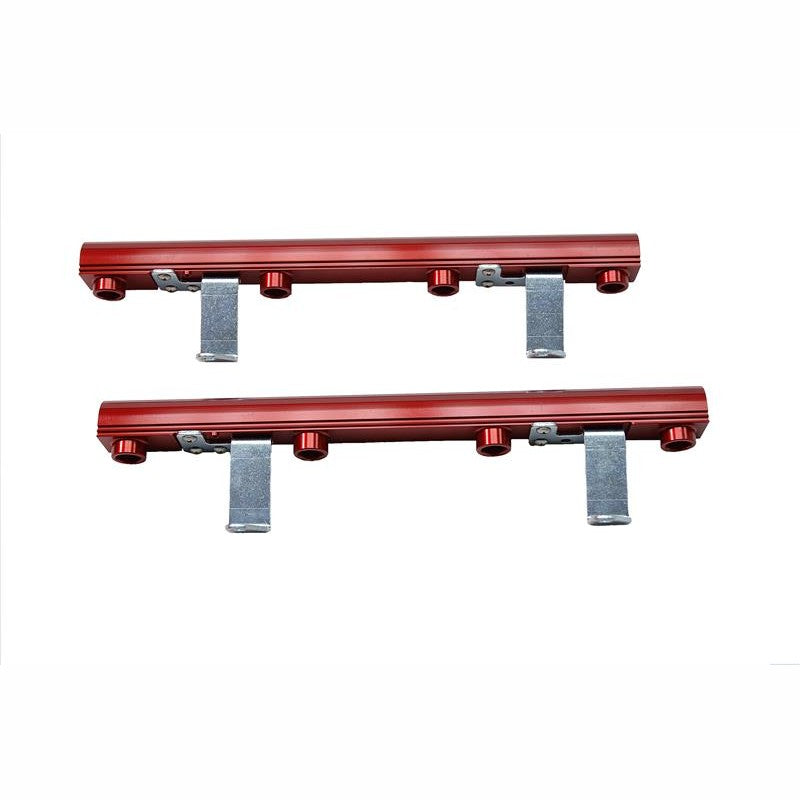 Red anodized CNC-machined billet aluminum fuel rails with steel mounting brackets for Ford Mustang 4.6L engines.
