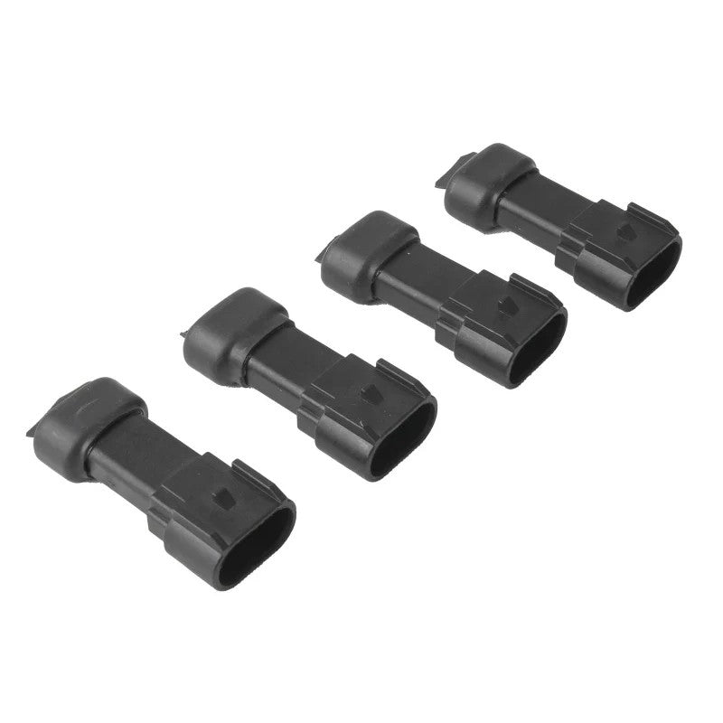 Set of four aFe CONTROL ride height simulator modules with GM Style Weatherpack connectors and thermal epoxy.