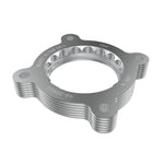 Orange anodized CNC-machined aluminum aFe Silver Bullet throttle body spacer for 2021-2026 Subaru Crosstrek.
