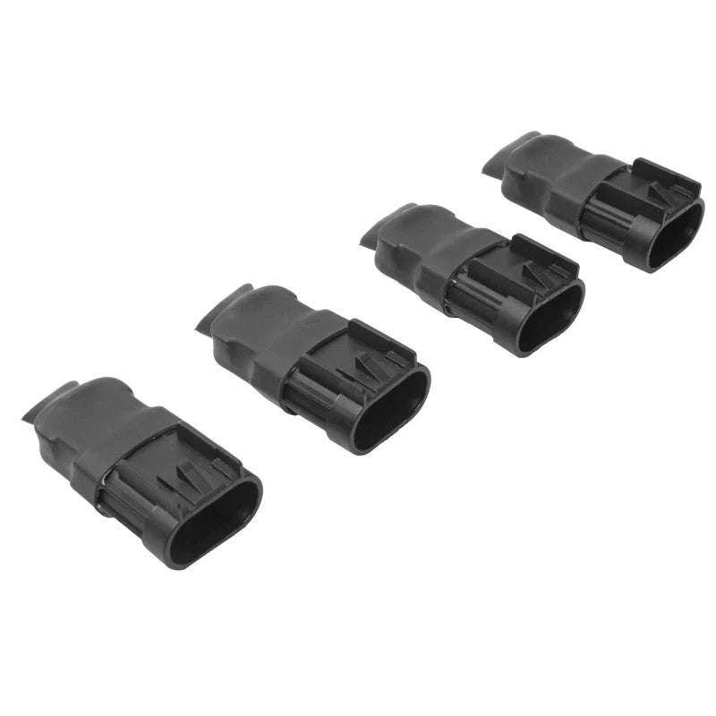 Set of four aFe Control ride height simulator modules featuring GM-style Weatherpack connectors and black thermal epoxy.