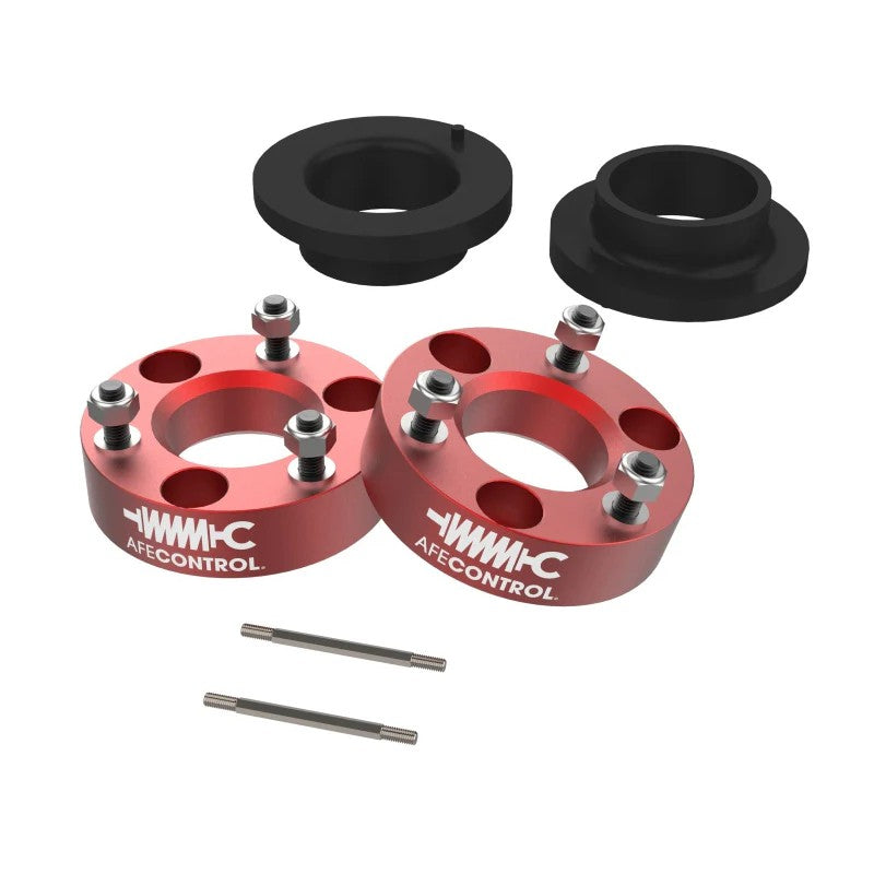 Red anodized CNC-machined billet aluminum leveling spacers and ride height sensor rods for Ram 1500 TRX