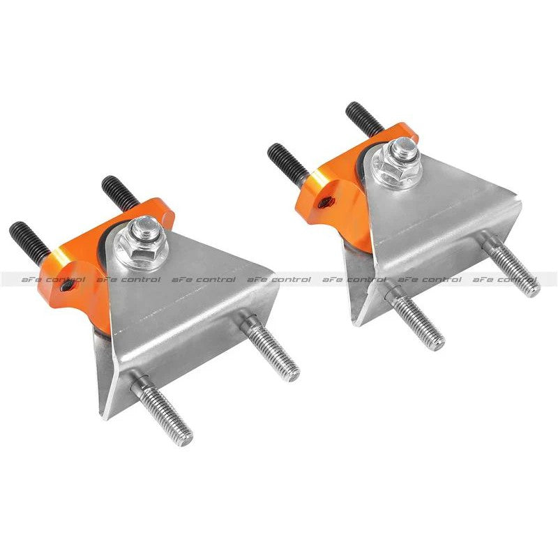 Orange anodized aFe Control PFADT Series transmission mount set with nickel plated chassis mounts and hardware.