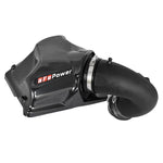 aFe Stage-2 Pro 5R cold air intake system with carbon fiber look cover and blue oiled air filter for BMW B48 engines.