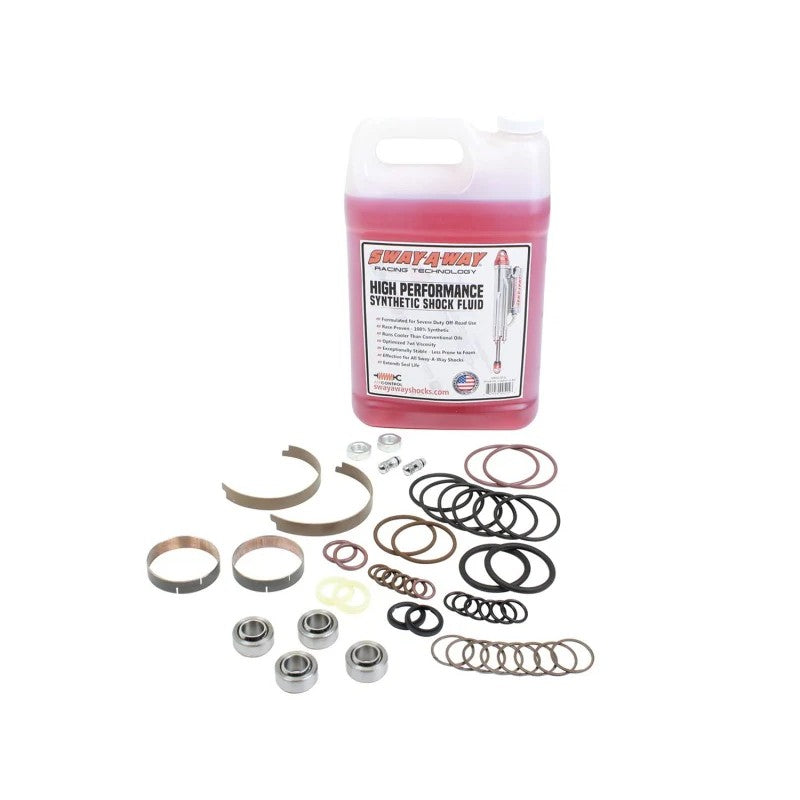 aFe POWER Sway-A-Way Master Rebuild Kit including 7/8 inch shaft seals, wearbands, shims, and a gallon of shock oil.