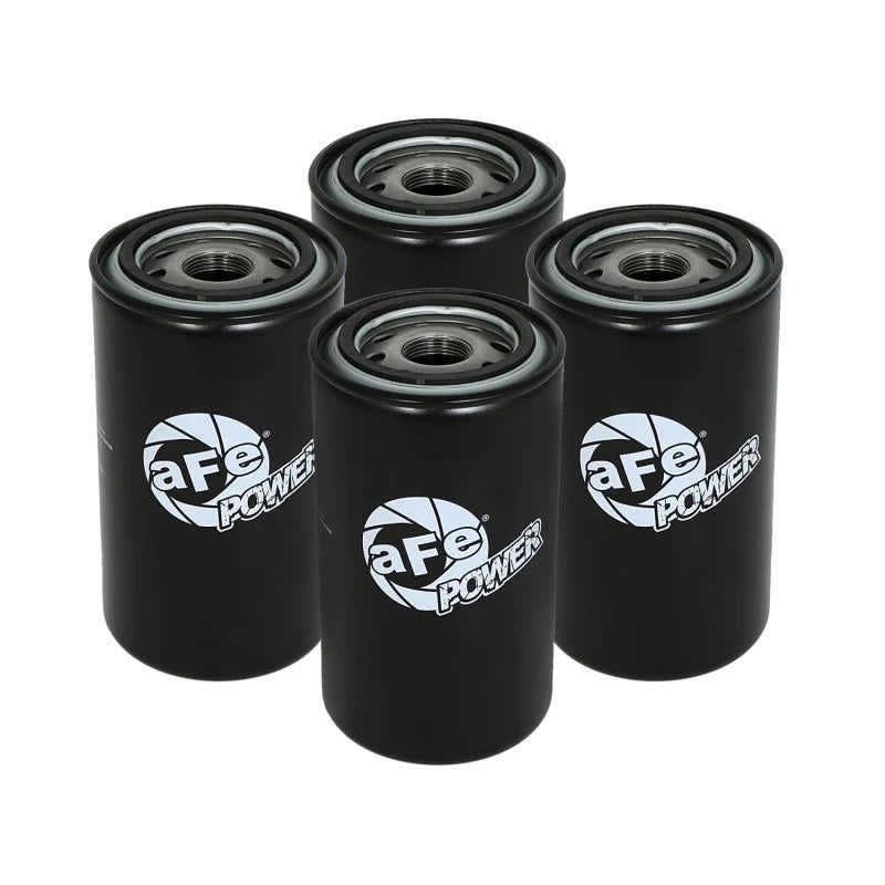 Four aFe ProGuard D2 high-flow diesel oil filters for 5.9L and 6.7L Dodge Ram trucks