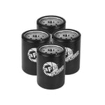 Set of four aFe Power ProGuard D2 heavy-duty oil filters with black canisters and white logo branding.