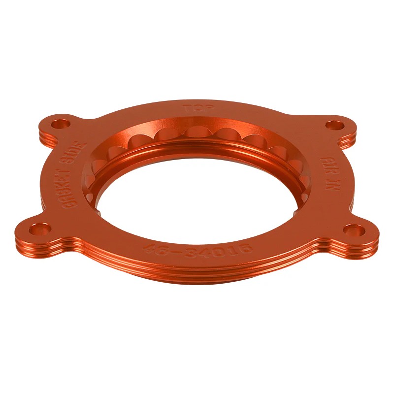 Anodized 6061-T6 billet aluminum aFe Silver Bullet throttle body spacer with serrated helix design entry.