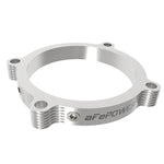 aFe Silver Bullet clear anodized 6061-T6 billet aluminum throttle body spacer with dual 1/8 inch NPT ports.