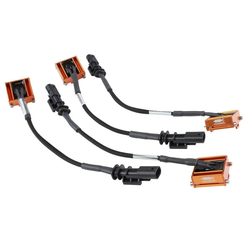 aFe Control electronic shock delete modules with small Metri-Pack connectors and braided wiring shields.