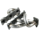 aFe Power Twisted Steel 409 stainless steel exhaust headers showing mitered collectors and thick CNC-machined head flanges