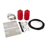 Red Air Lift 1000 universal polyurethane air springs with air lines, Schrader valves, and installation hardware.