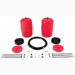 Two red polyurethane Air Lift 1000 air springs with air lines and installation hardware for Toyota Sequoia.