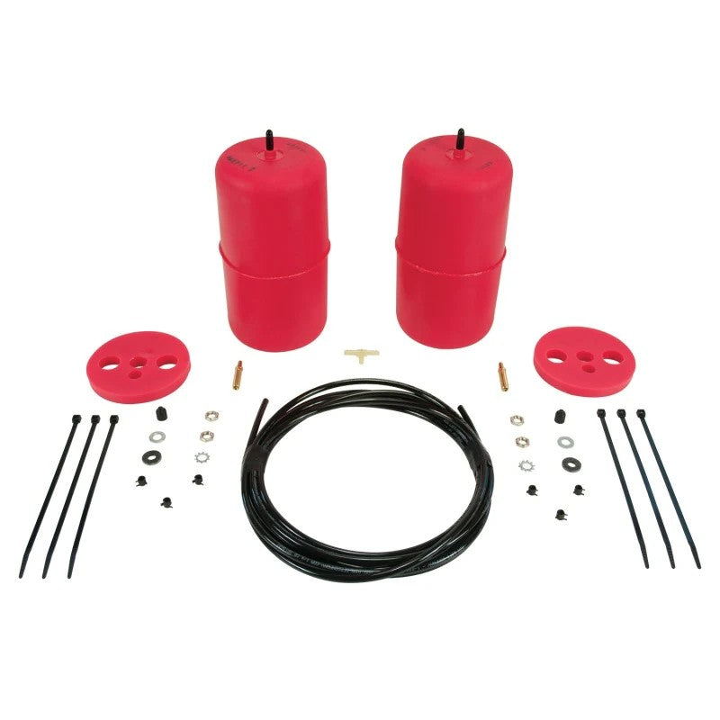 Molded polyurethane Air Lift 1000 air springs with installation hardware and air lines for Dodge Durango.