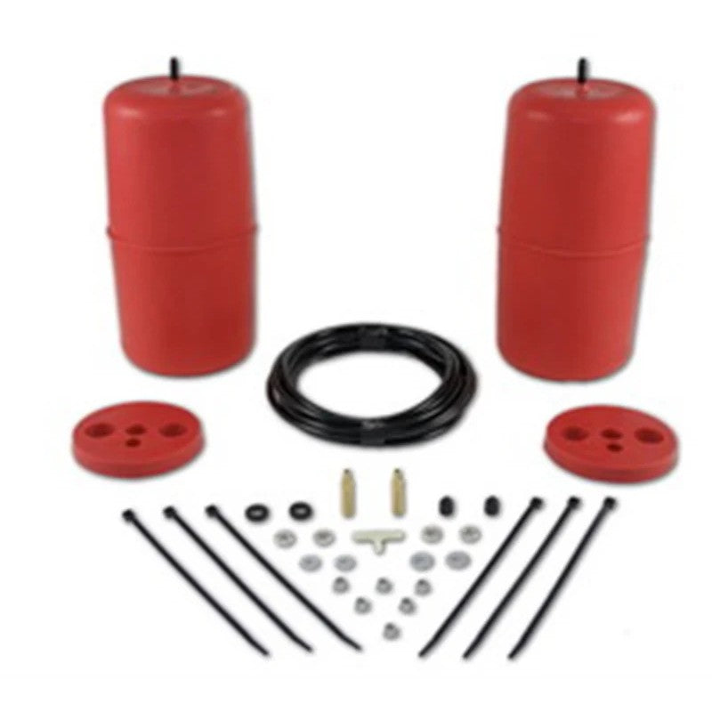 Molded polyurethane Air Lift 1000 helper air springs with air lines and installation hardware.