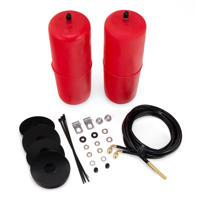 Red Air Lift 1000 polyurethane air springs with air lines and installation hardware.