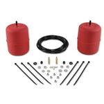 Red molded polyurethane Air Lift 1000 air helper springs with air lines and installation hardware.