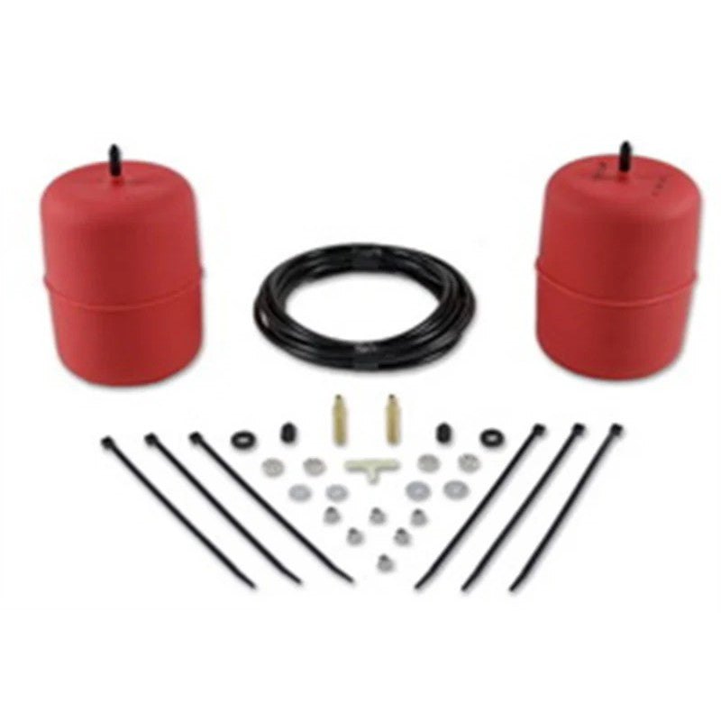 Red molded polyurethane Air Lift 1000 air helper springs with air lines and installation hardware.