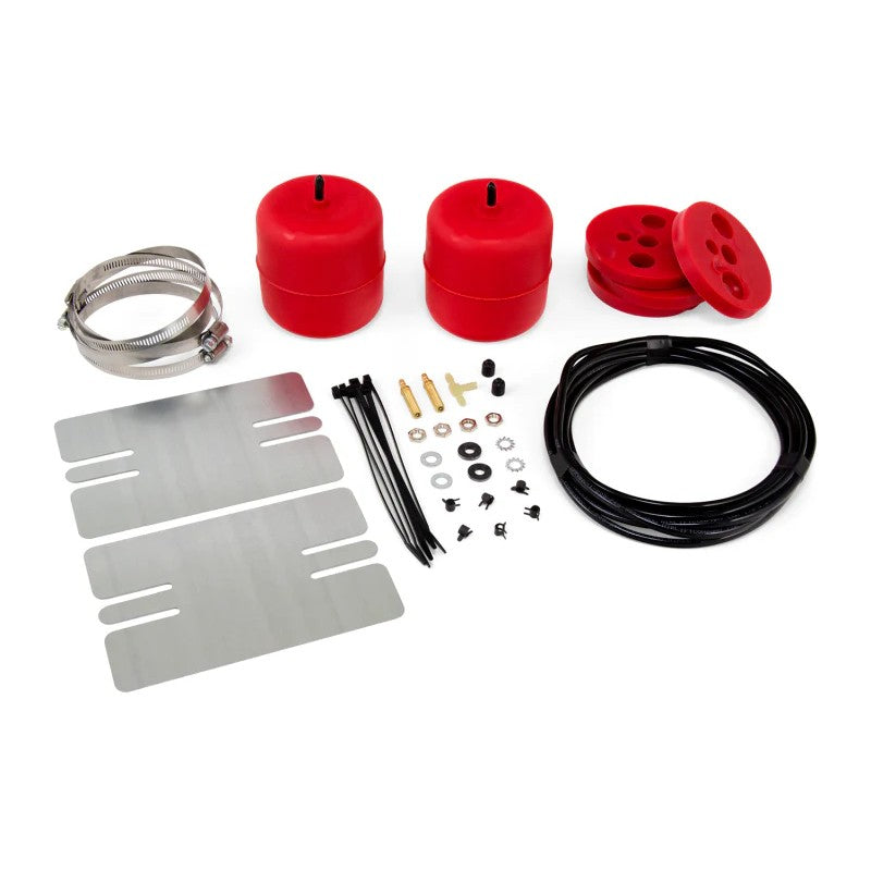 Air Lift 1000 molded polyurethane universal air springs with air lines, tee fittings, and installation hardware.