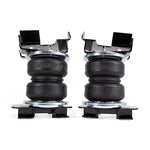 Air Lift LoadLifter 5000 air spring kit featuring two heavy-duty bellows, mounting brackets, and air line hardware.