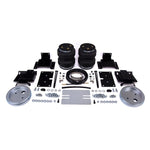 Air Lift LoadLifter 5000 air spring kit with reinforced air bags, protective roll plates, and mounting hardware