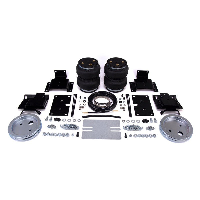 Air Lift LoadLifter 5000 air spring kit with reinforced air bags, protective roll plates, and mounting hardware